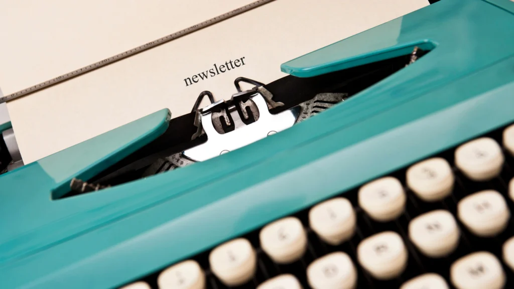 writing machine with newsletter typed to illustrate email marketing